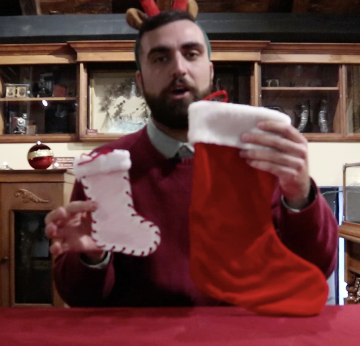 A man holding a christmas stocking
